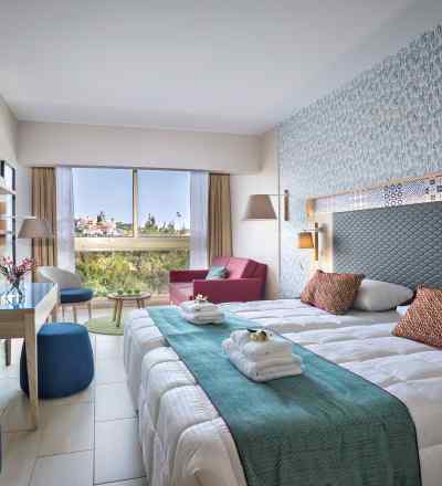 Family room at Leonardo Laura Beach & Splash Resort with inland view