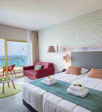 Family room at Leonardo Laura Beach & Splash Resort with sea view